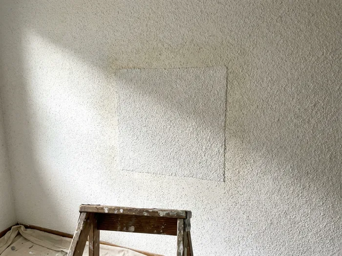 Popcorn ceiling texture blended after repair