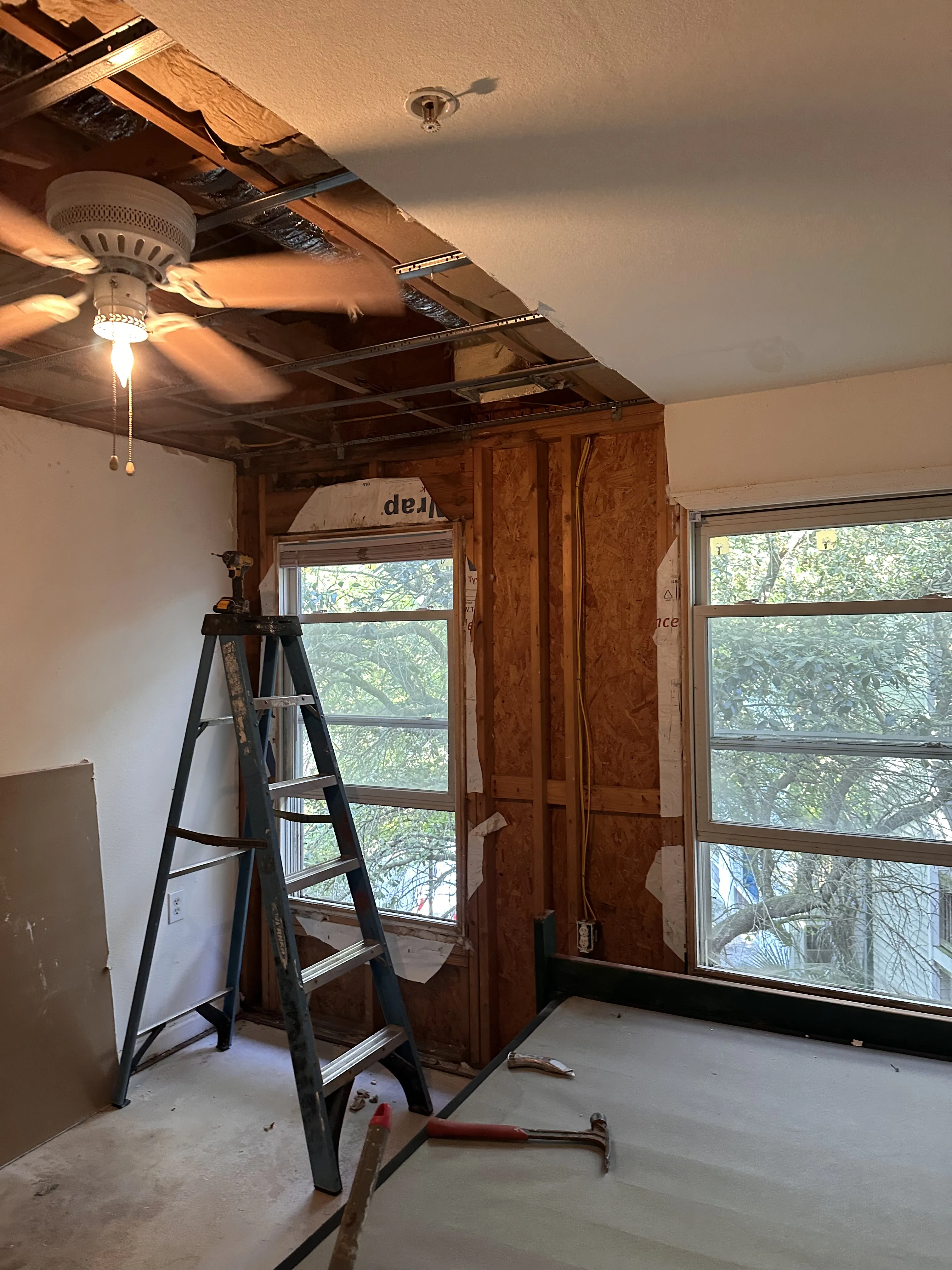 Textured ceiling with damage before repair in a Charleston area home