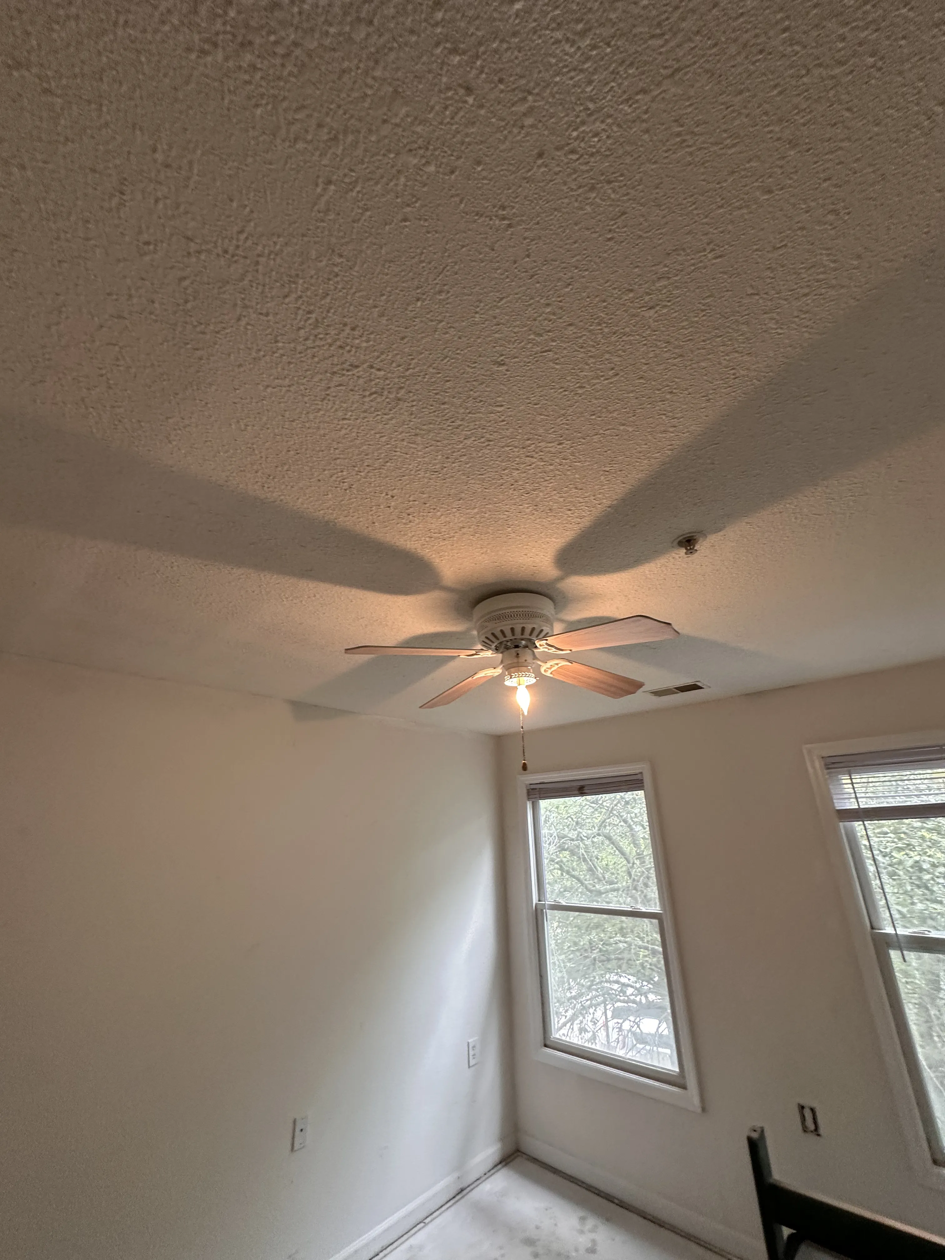 Same ceiling after repair, with the texture rebuilt so the patch is not visible